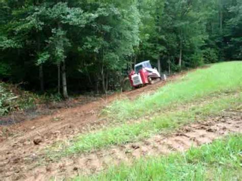 skid steer on a slope|skid steer slope.